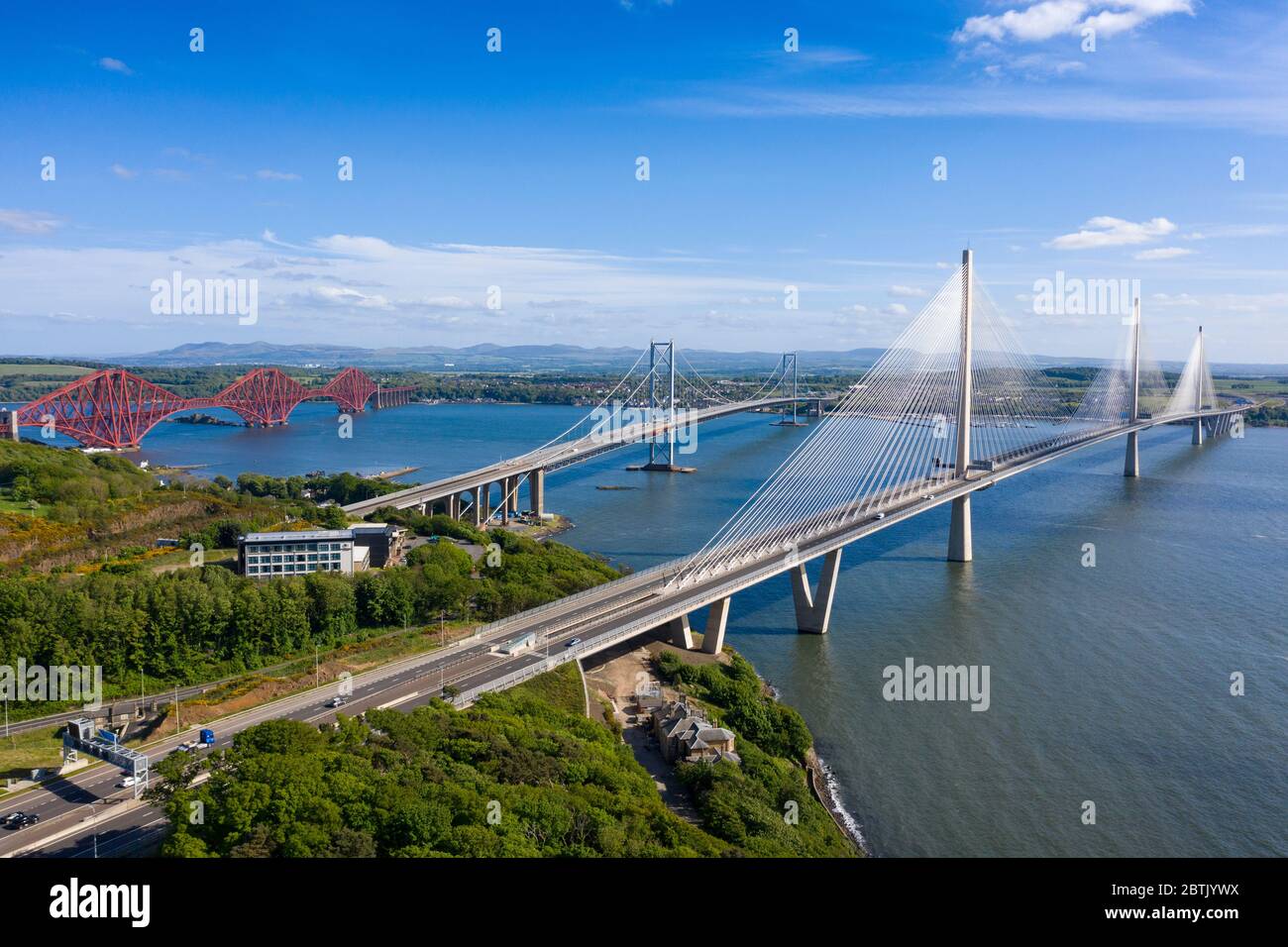 Aerial view of three bridges crossing the River Forth with new Queensferry Crossing in front at North Queensferry, Fife, Scotland, UK Stock Photo
