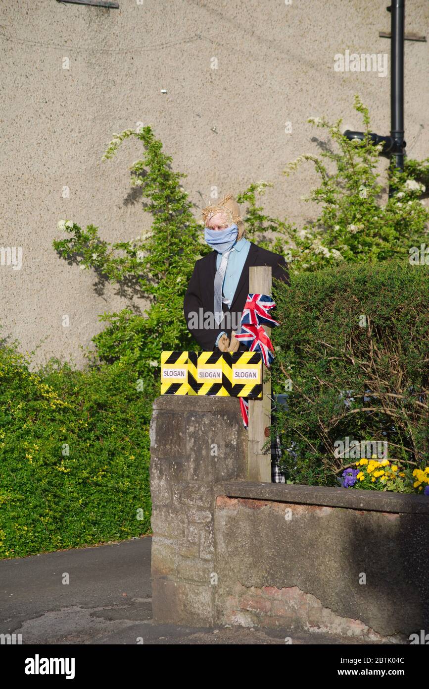 Ovingham, England, 26 May 2020. A dummy representing Boris Johnson wearing a facemask stands at a gateway in Ovingham, Northumberland. Credit: Colin Edwards/Alamy Live News. Stock Photo