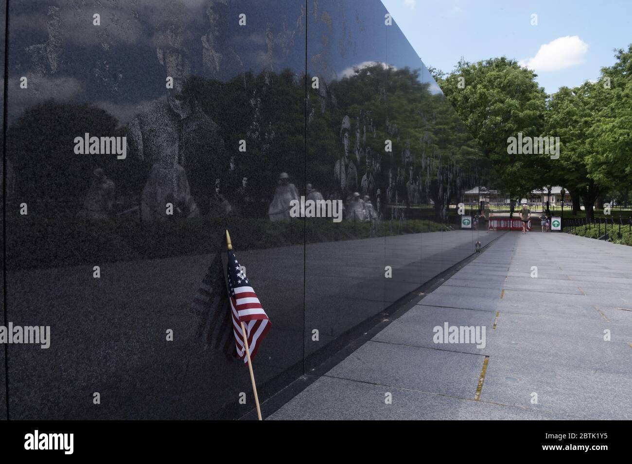 Washington, USA. 26th May, 2020. US citizen visit Korea War monument and pay honor to soldiers who died in the war, during the Memorial Day today on May 26, 2020 in Washington DC, USA. Memorial Day Parade was canceled due to the Coronavirus 19 pandemic. (Photo by Lenin Nolly/Sipa USA) Credit: Sipa USA/Alamy Live News Stock Photo