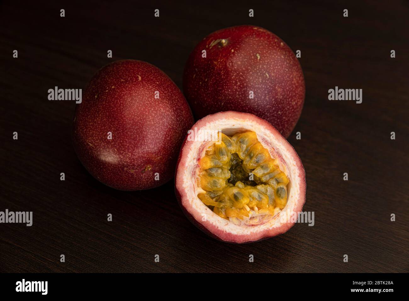 Passion fruit on a dark background Stock Photo