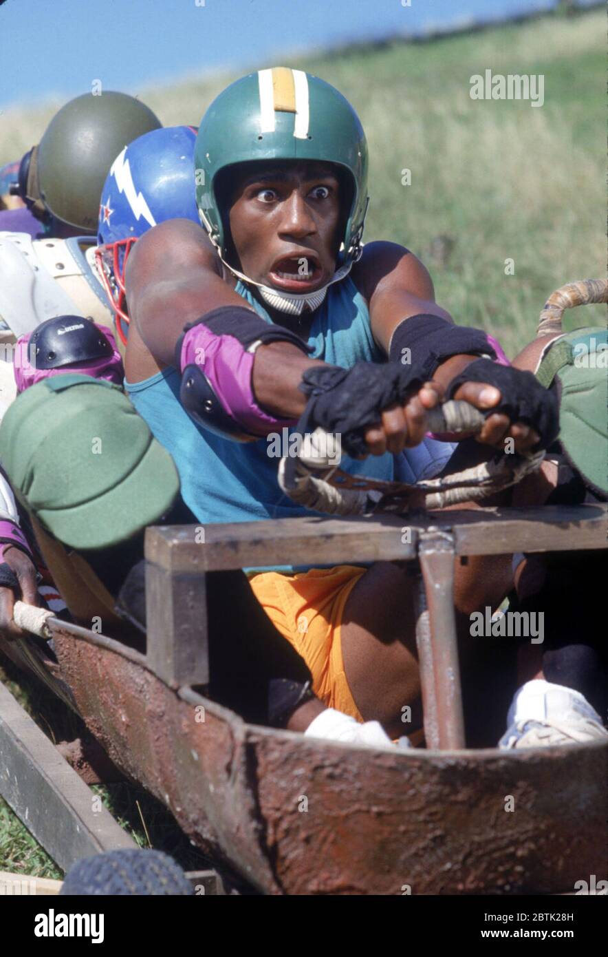 Cool Runnings is a 1993 American comedy sports film directed by Jon Turteltaub and starring Leon Robinson, Doug E. Doug, Rawle D. Lewis, Malik Yoba, and John Candy.   this photograph is for editorial use only and is the copyright of the film company and/or the photographer assigned by the film or production company and can only be reproduced by publications in conjunction with the promotion of the above Film. A Mandatory Credit to the film company is required. The Photographer should also be credited when known. Stock Photo