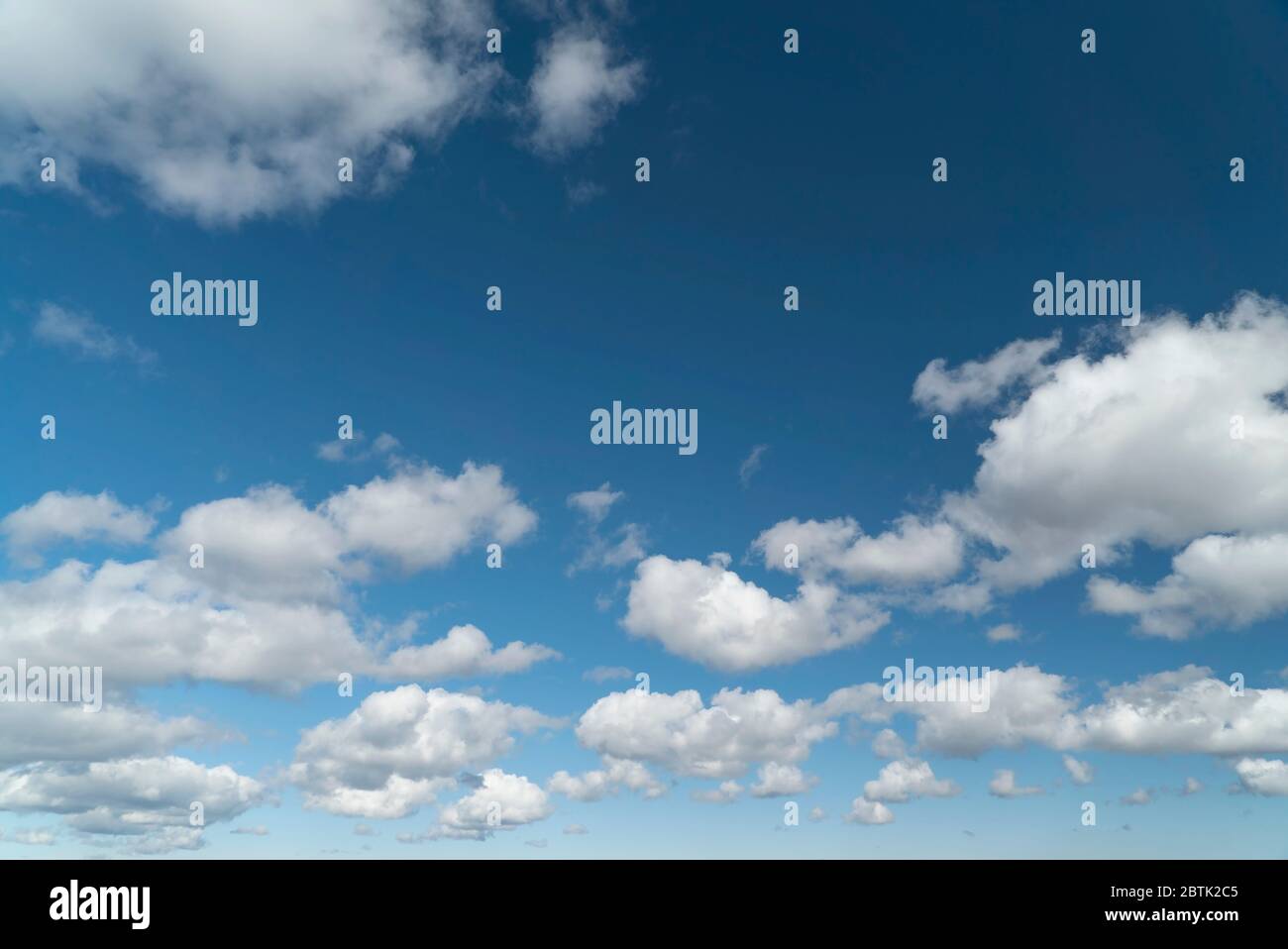 Light clouds in the blue sky during the day Stock Photo - Alamy