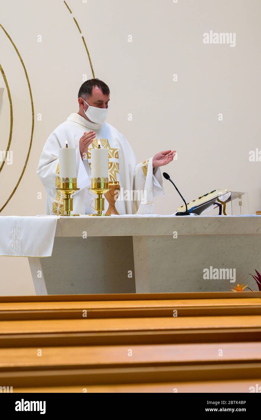 Bratislava, Slovakia. 2020/5/11. Holy mass being celebrated during the COVID-19 pandemic. The measures include wearing face masks and distancing. Stock Photo