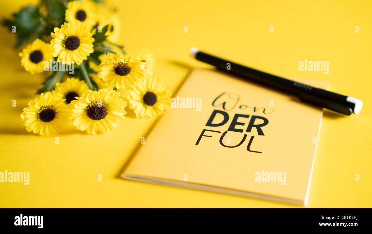 Beautiful yellow ideas keeper. Background for modern girl education concept. Planer notes. Write daily schedule. Stock Photo