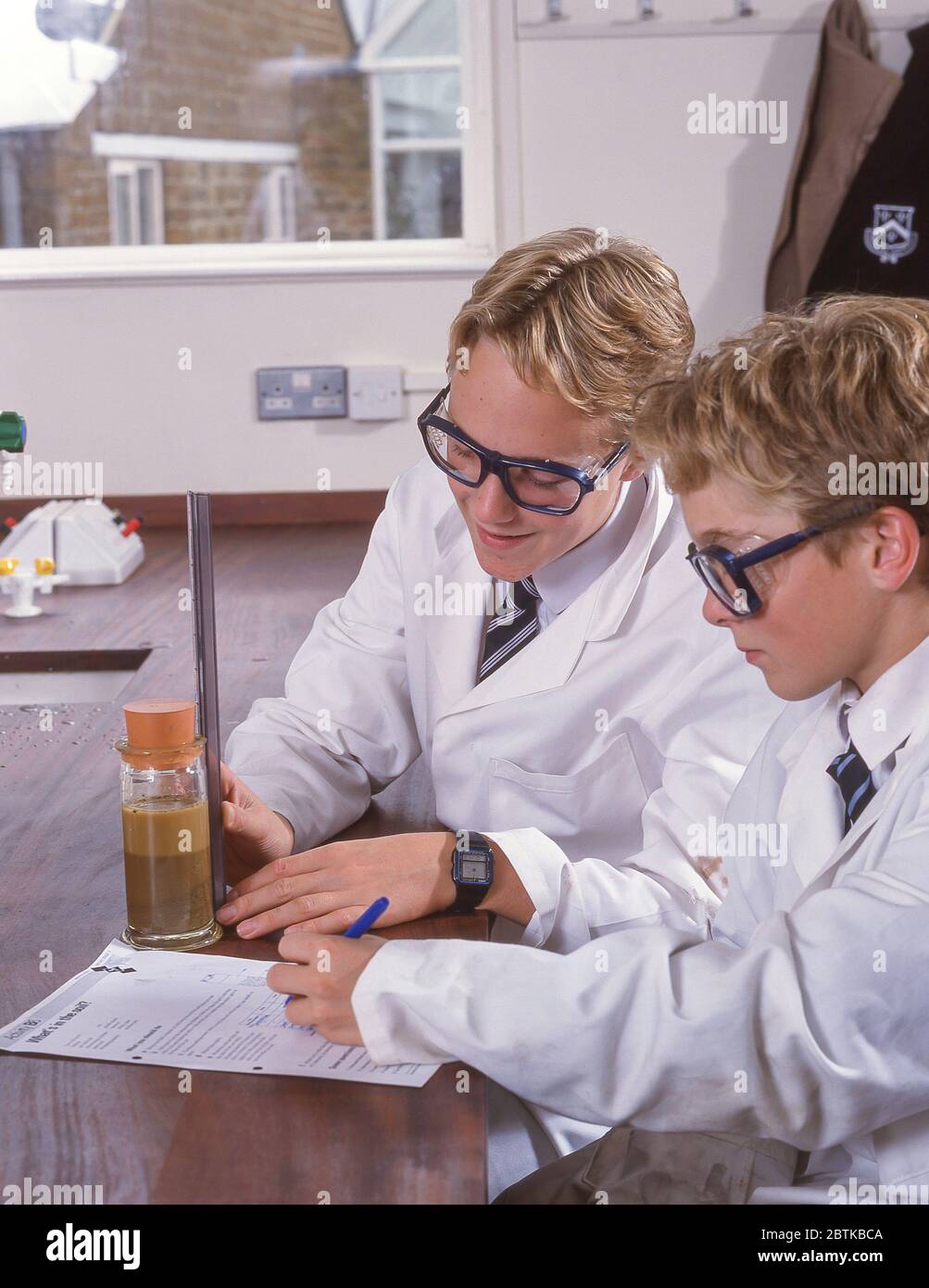 Students in science class, Surrey, England, United Kingdom Stock Photo