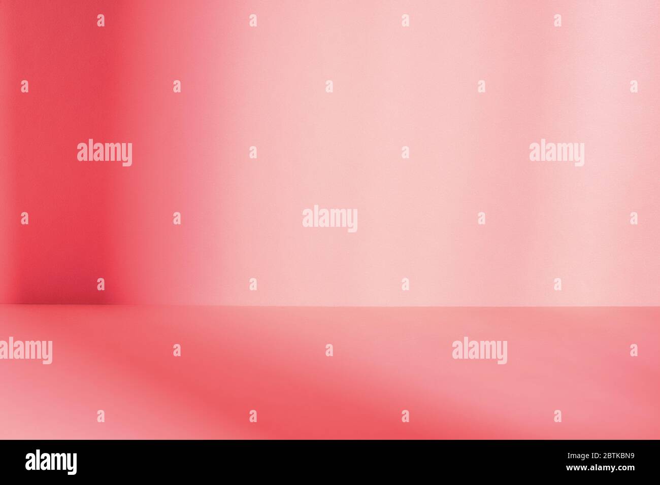 Empty pink studio space with deep windows shadow. Sparse template and background Stock Photo