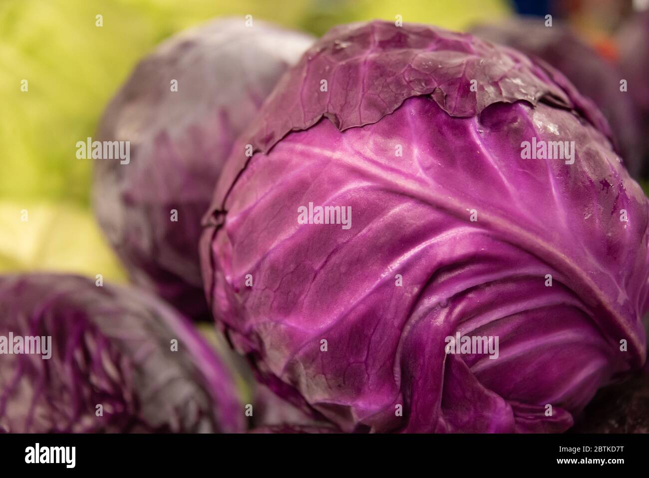 Red and green cabbage at a roadside fresh fruit and vegetable market in