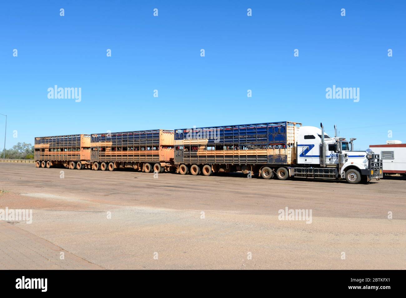 Australian cattle truck road train parked by the side of the Stuart Highway, Northern Territory, NT, Australia Stock Photo