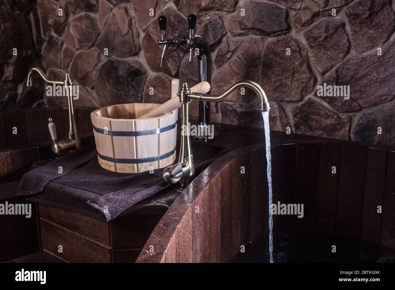 Wooden bath accessories in the sauna Stock Photo - Alamy