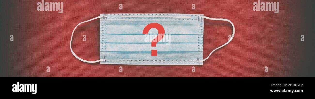 Corona virus face mask top view with red question mark background ...