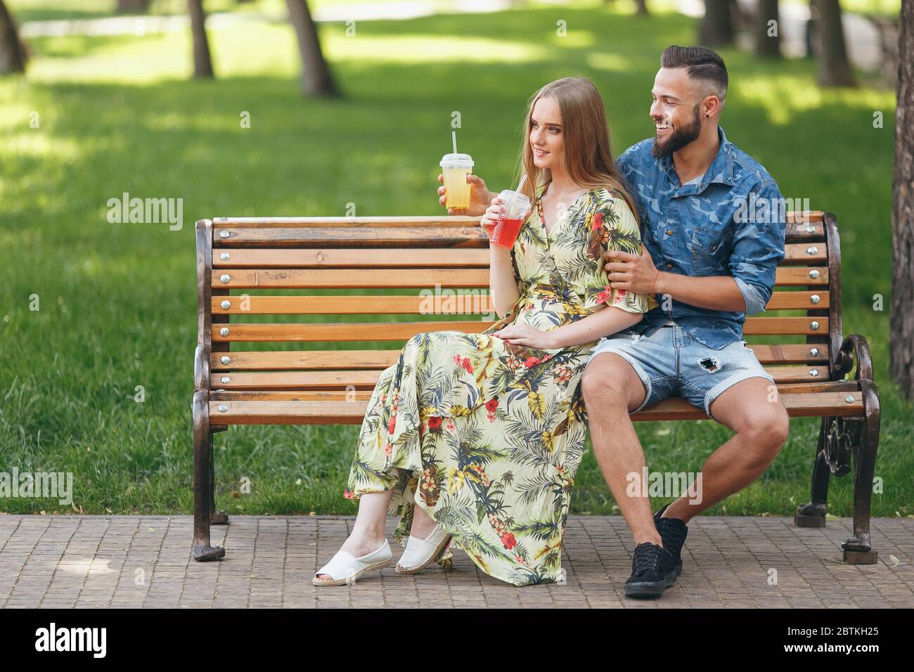 Male Model Posing On Bench High Resolution Stock Photography And Images Alamy https www alamy com fashion young teenage couple resting in a city park with drinks sitting on a bench on a sunny summer day image359389581 html