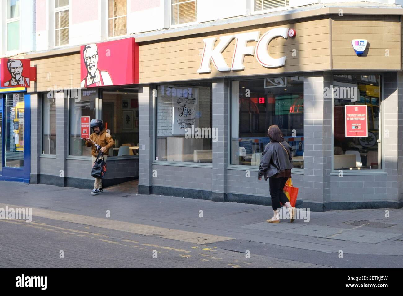 Kentucky Fried Chicken (KFC) shop front in Sutton High Street, open for a delivery service only in May 2020 due to Covid-19 Stock Photo