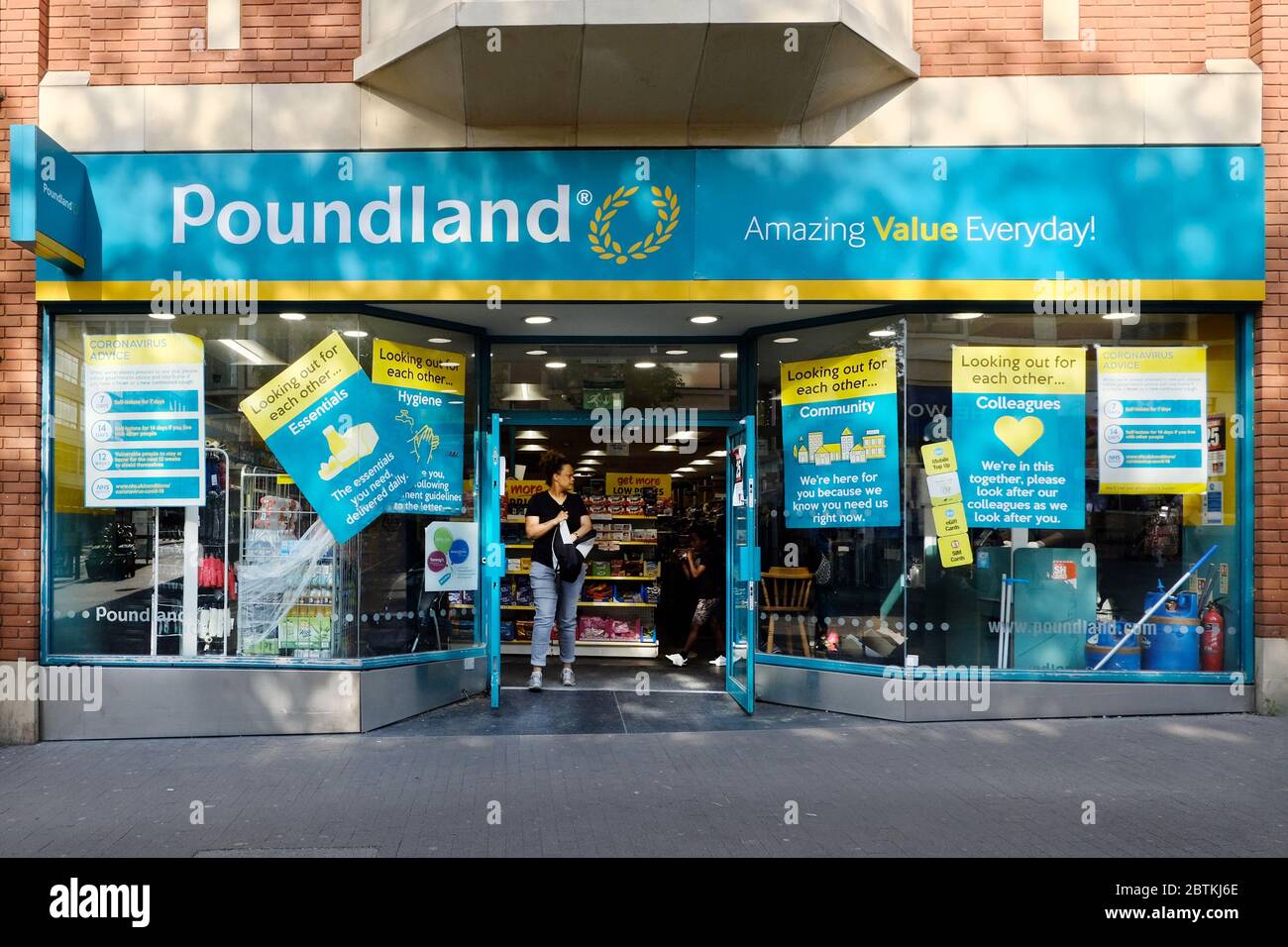 Poundland retail store shopfront in Sutton High Street, Sutton, Surrey. Stock Photo