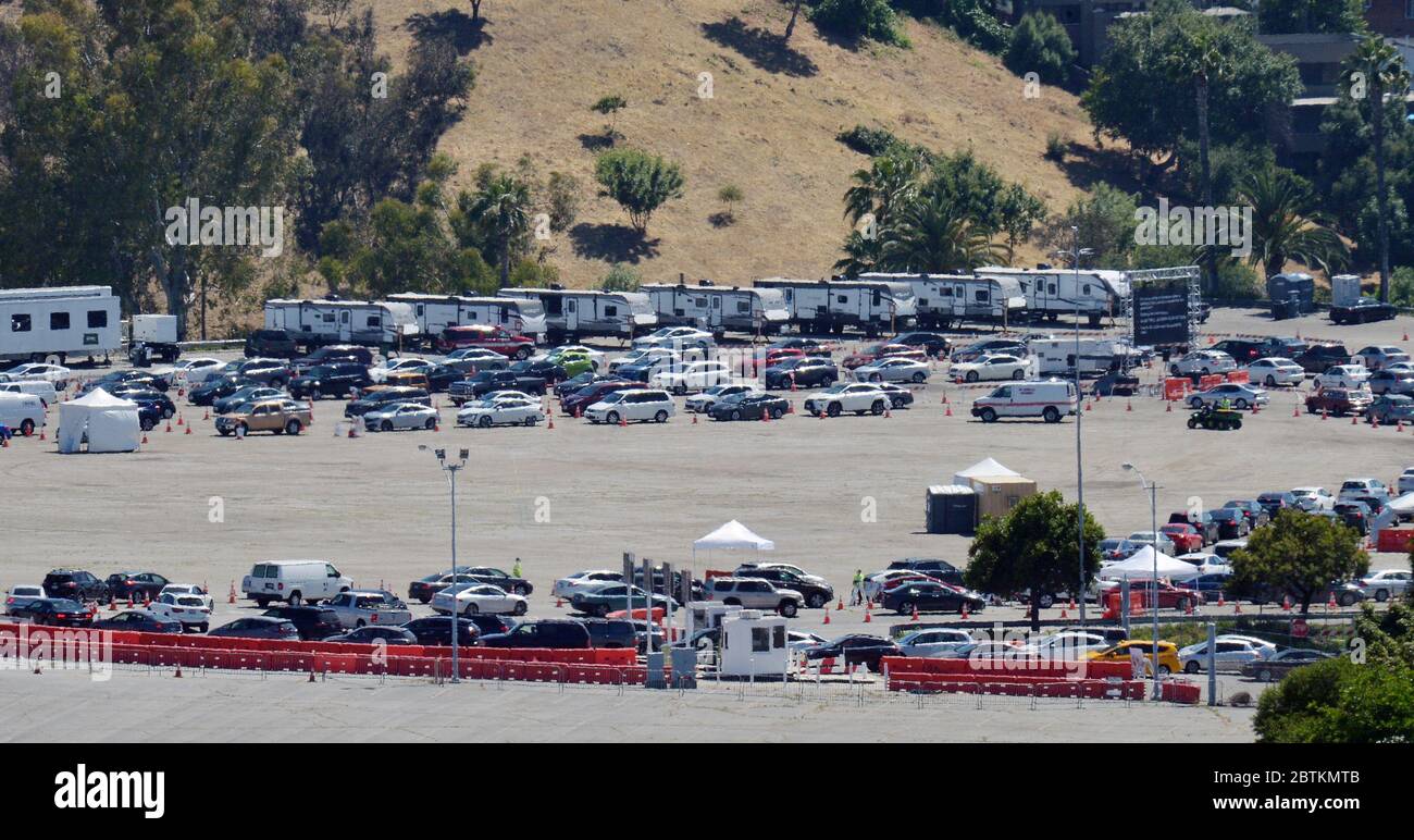 Los Angeles, USA. 26th May 2020. Residents are tested in the Dodger Stadium parking lot at a new COVID-19 testing site in Los Angeles on Tuesday, May 26, 2020. In announcing the center on Friday, Mayor Eric Garcetti said health officials.would be testing as many as 6,000 people a day at the new location, where he said he was tested for COVID-19 himself. City officials say will accommodate three times more people than any other testing site in Los Angeles County.  Photo by Jim Ruymen/UPI Credit: UPI/Alamy Live News Stock Photo