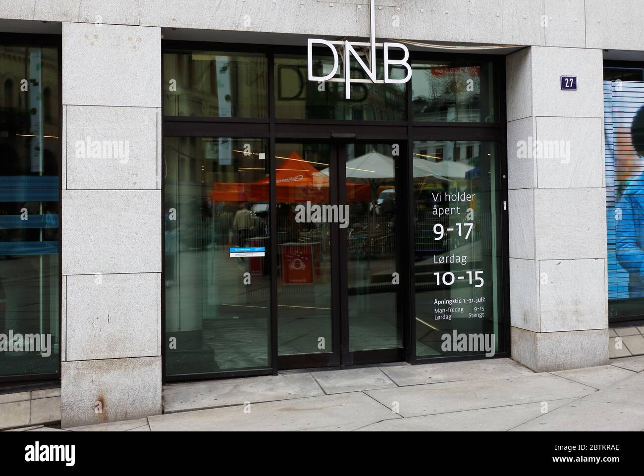 Oslo, Norway - June 20, 2019: Exterior view of the DNB bank office entrance at the 27 Karl Johans gate situated in the downtown district. Stock Photo