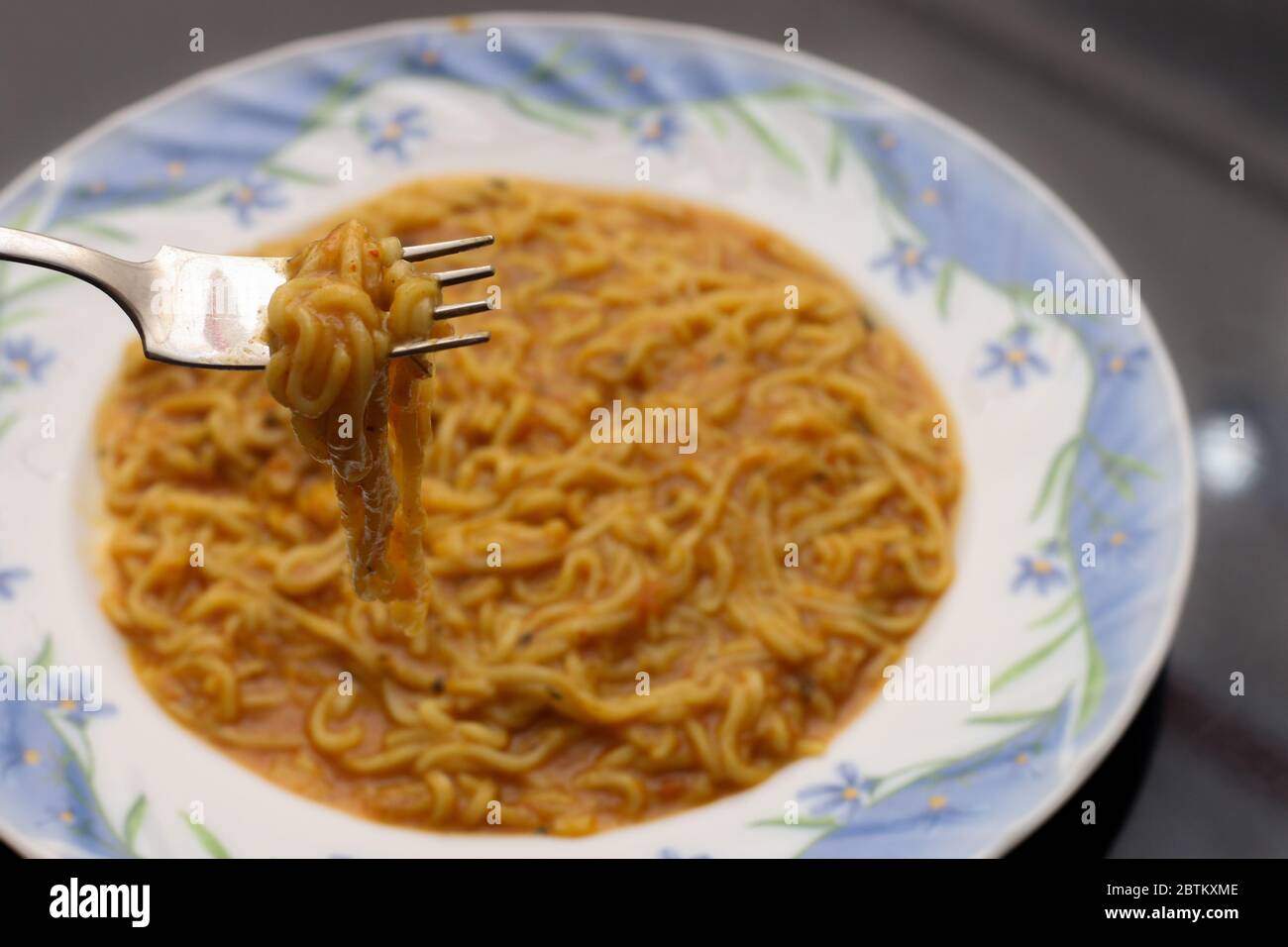 Noodles view with a fork Stock Photo Alamy