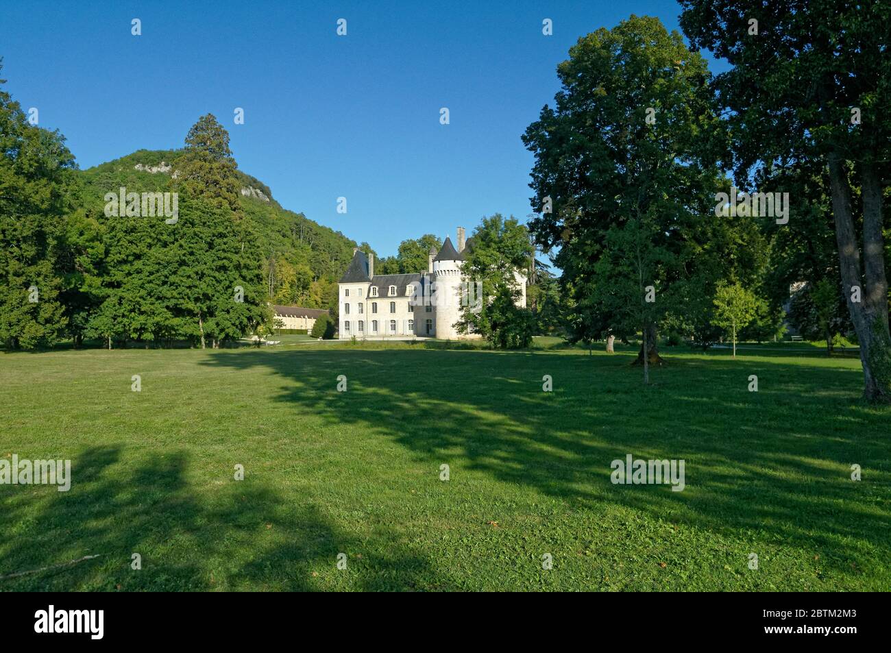 Castel of Campagne, Dordogne, France surrounded by beautiful park. Stock Photo