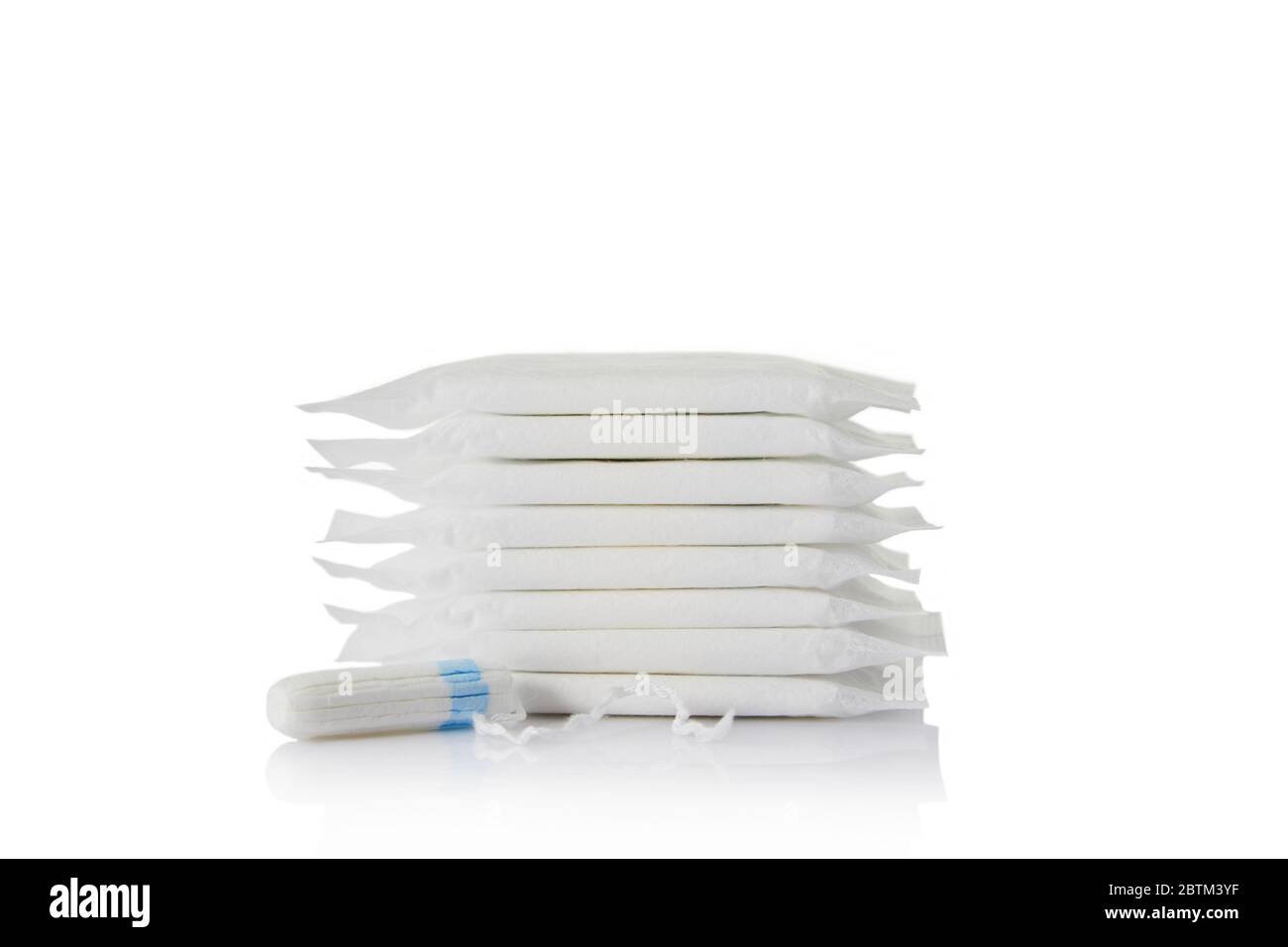 menstrual sanitary pads and cotton tampon on white background. Feminine