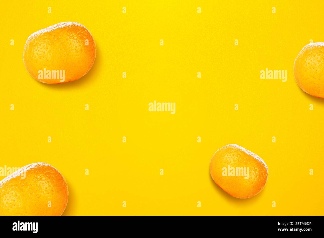 Vivid yellow background hi-res stock photography and images - Alamy