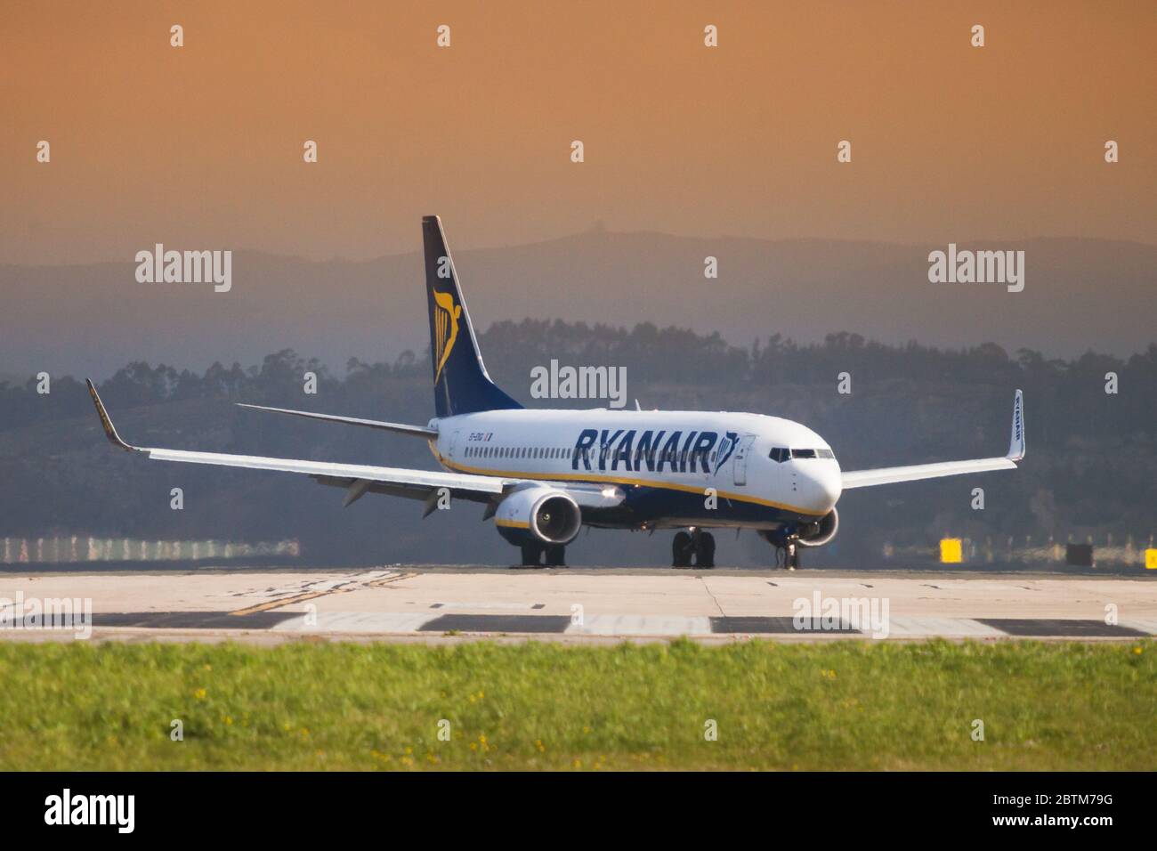 Seve Ballesteros airport, Santander, Spain - 12 March, 2018: Ryanair Boing 737 on the landing strip. The airline Ryanair offers flights from Santander Stock Photo