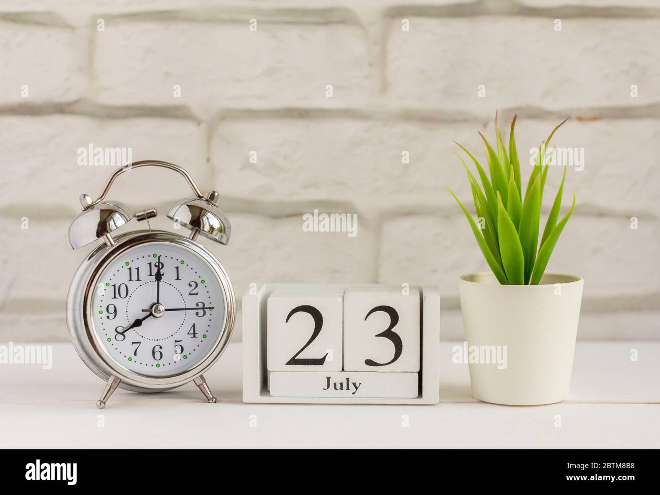 July 23 On A Wooden Calendar Next To An Alarm Clock On The Table Summer Day Empty Space For Text Calendar Date Birthday Or Holiday Stock Photo Alamy