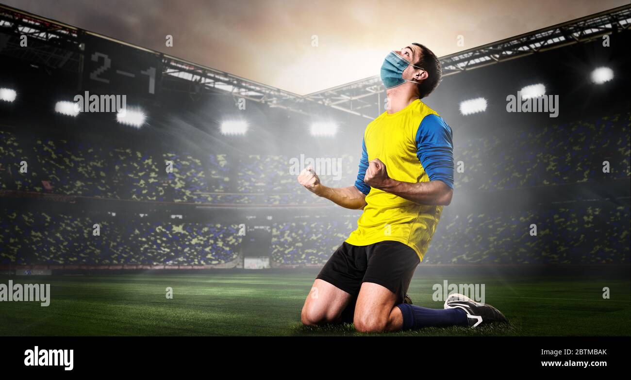 Soccer or football player in mask Stock Photo - Alamy