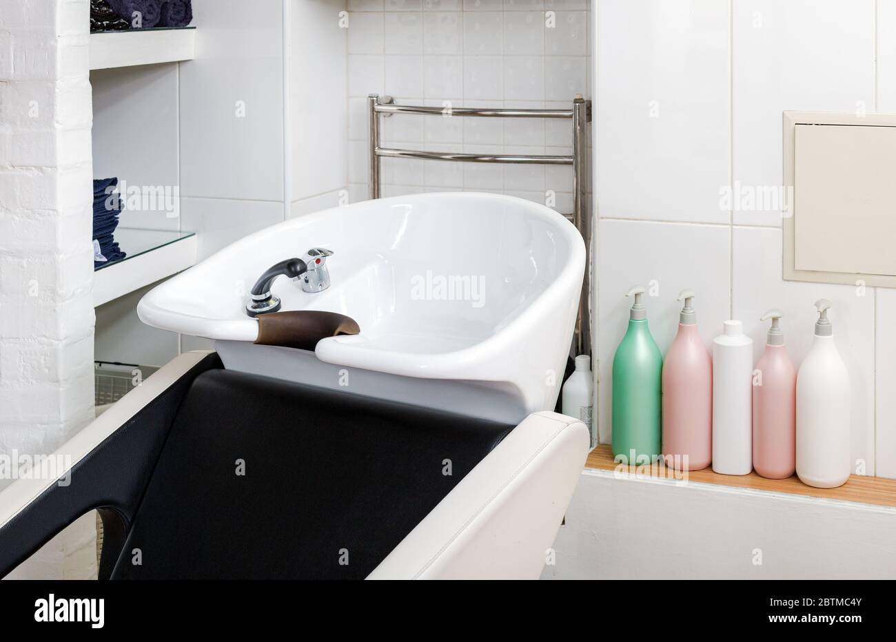 Hairdressing bowl, hair washer equipment. Beauty Salon Interior with copy  space. Hair wash sink for washing hair in beauty salon or Barber shop Stock  Photo - Alamy