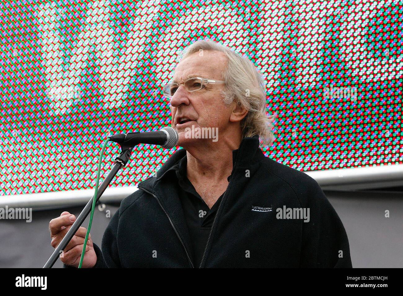 John Pilger joins Anti War protesters in London's Trafalgar Square demonstrate against ten years of conflict in Afghanistan Stock Photo