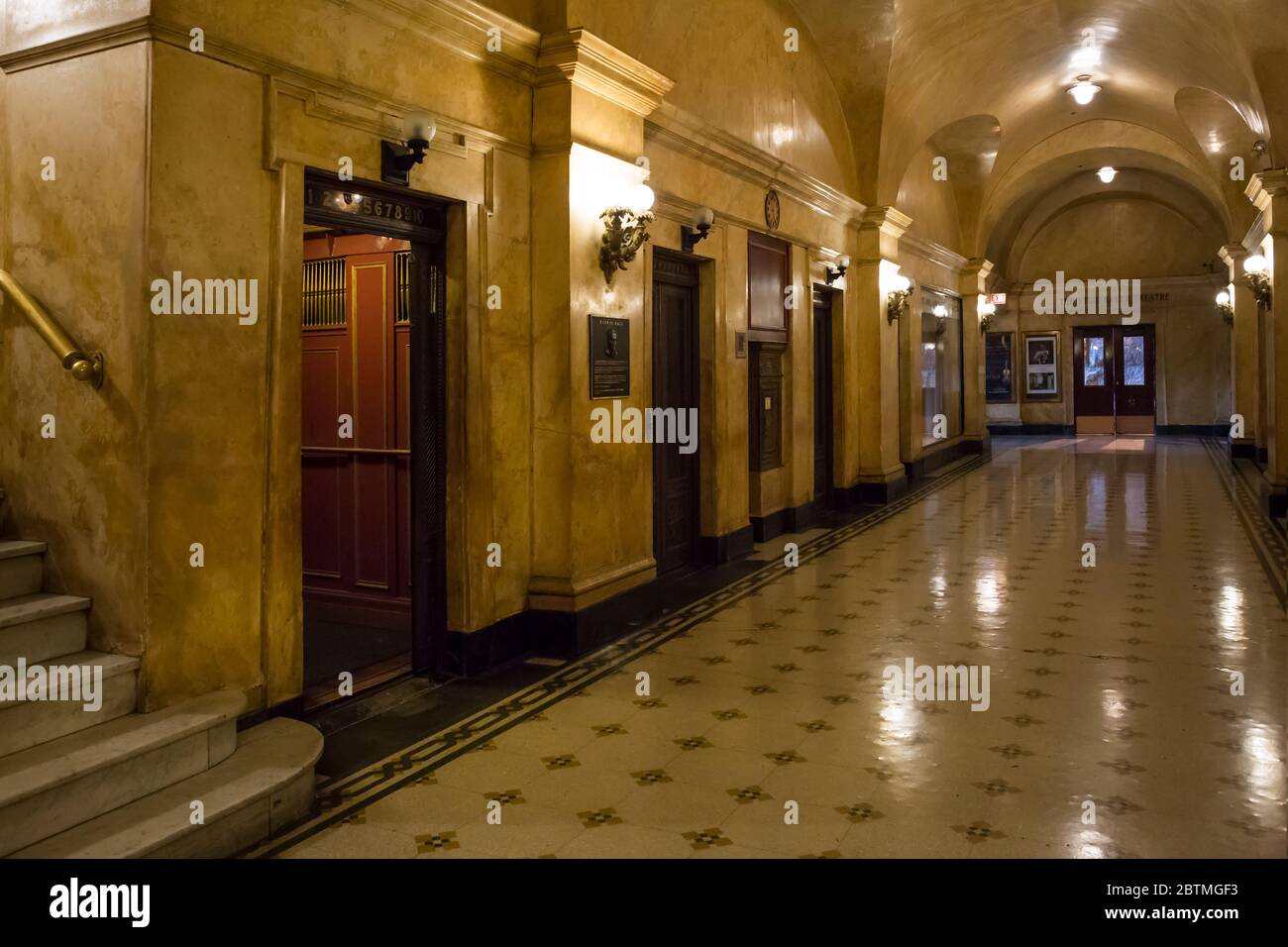 Horizontal shot of the Fine Arts Building (Studebaker Building) hall and elevators with an atmospheric and retro lightning, Chicago, Illinois, USA Stock Photo