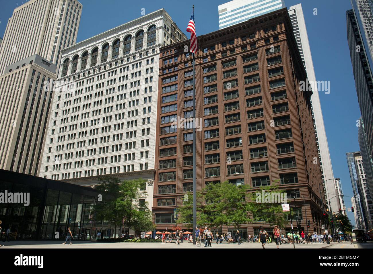 Horizontal panoramic view of the Federal Plaza with the Marquette Building at the background on a beautiful sunny day, Chicago, Illinois, USA Stock Photo