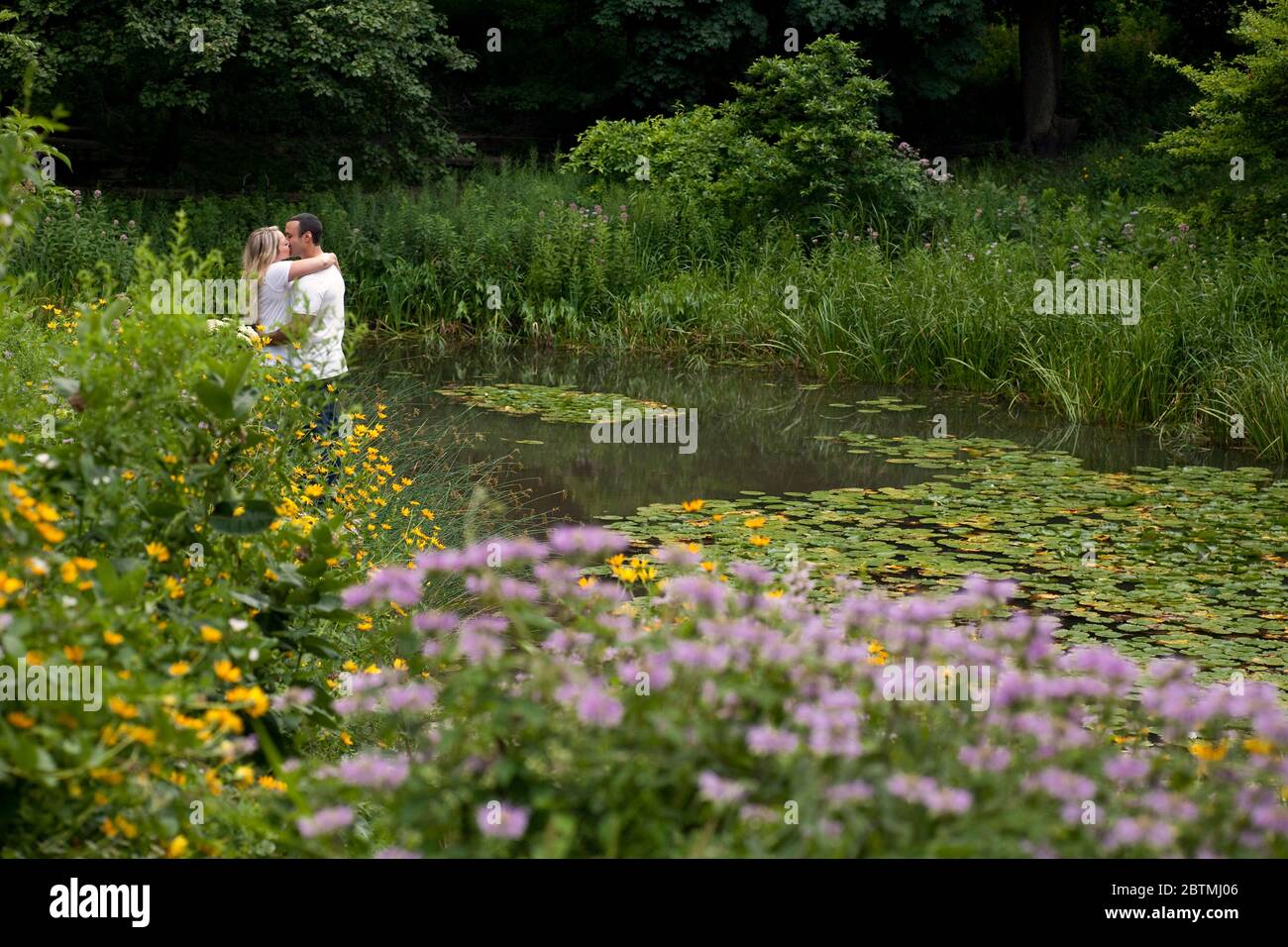 Horizontal view of a kissing young couple in the romantic Alfred