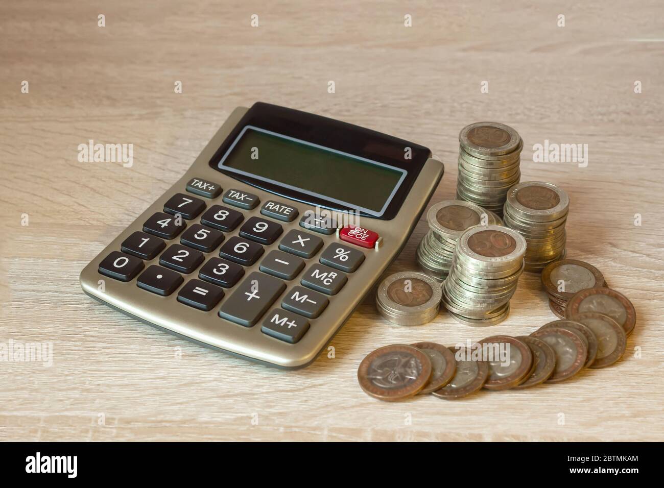 Coins stack calculator hi-res stock photography and images - Alamy