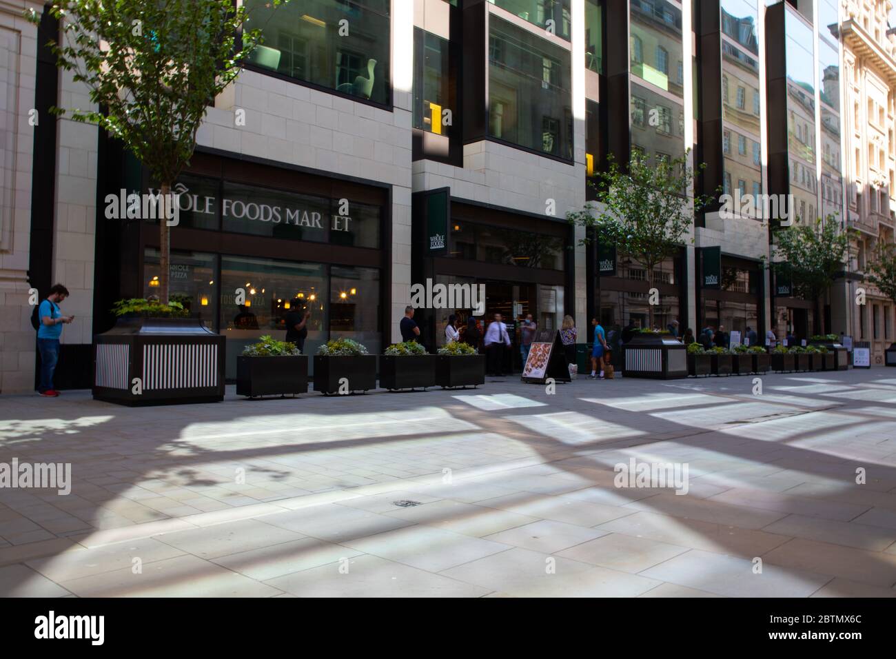 people-queueing-for-whole-foods-market-piccadilly-on-glasshouse-street