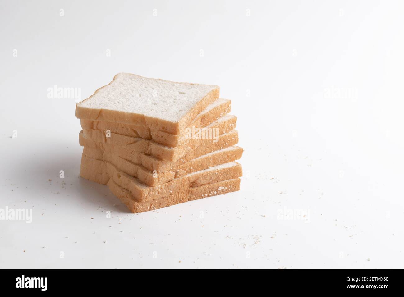 Slice of bread on the white background. Breads are a food made from