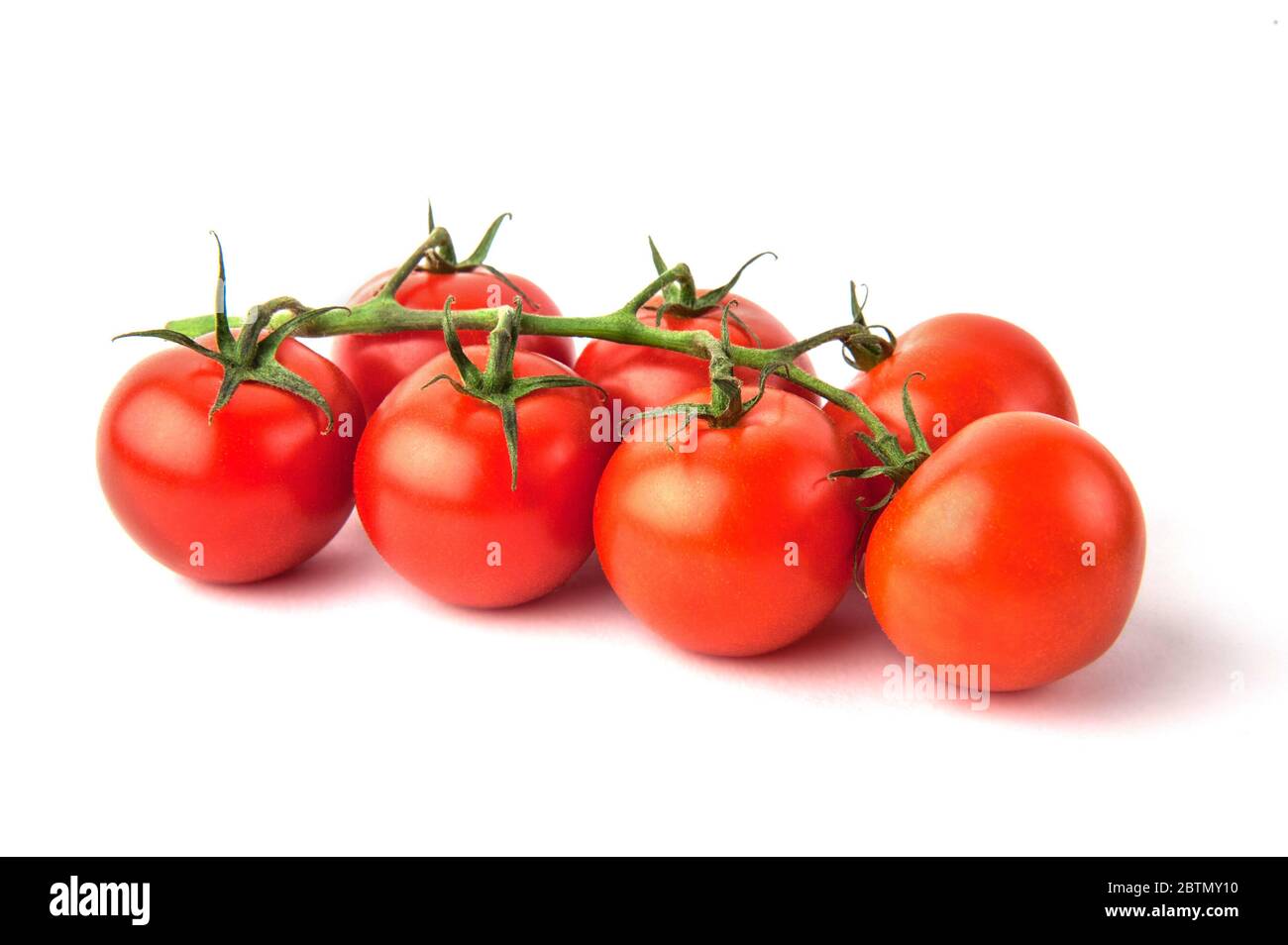 Branch of ripe cherry tomatoes isolated on white background Stock Photo ...