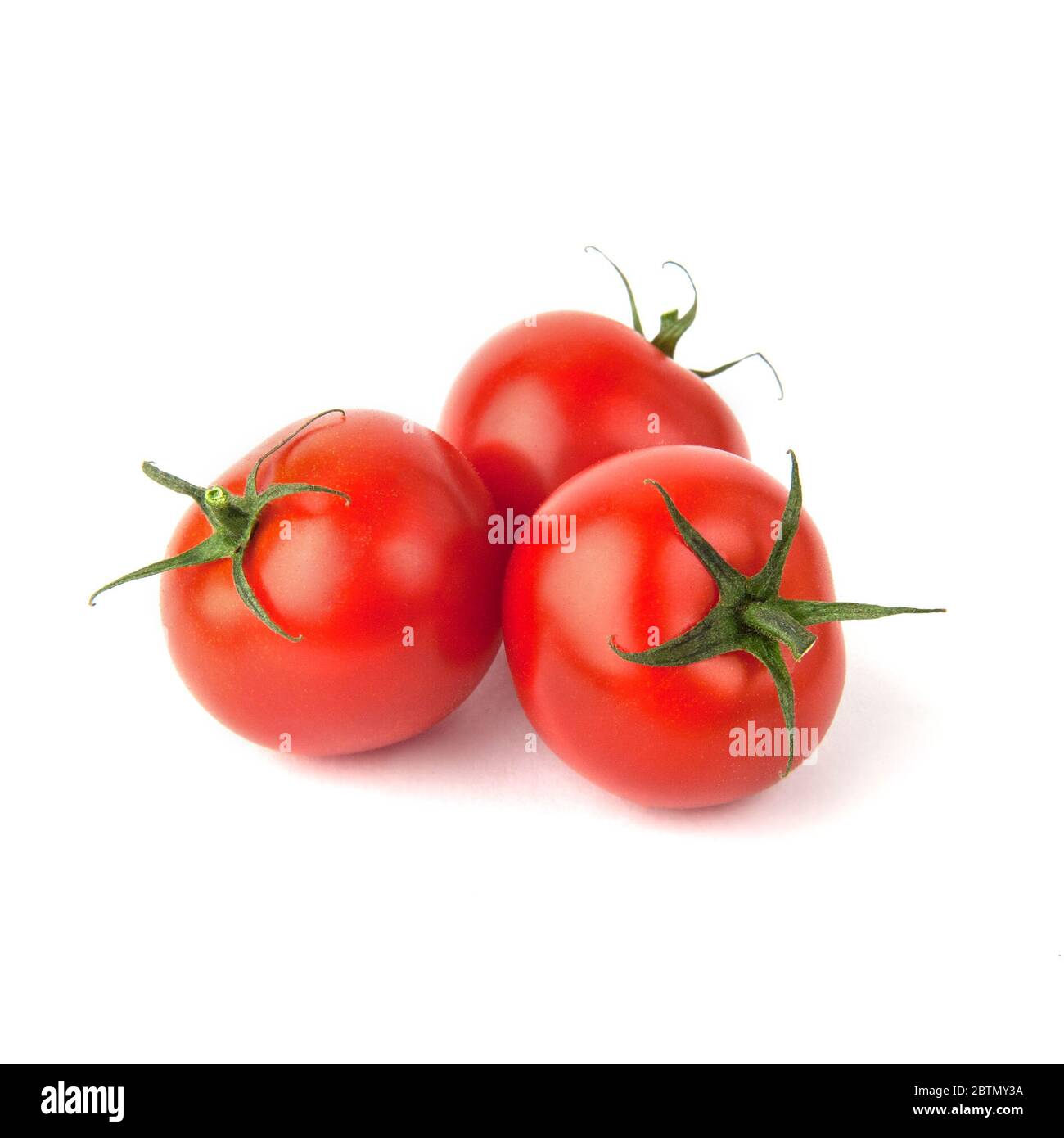 Ripe cherry tomatoes isolated on white background Stock Photo - Alamy