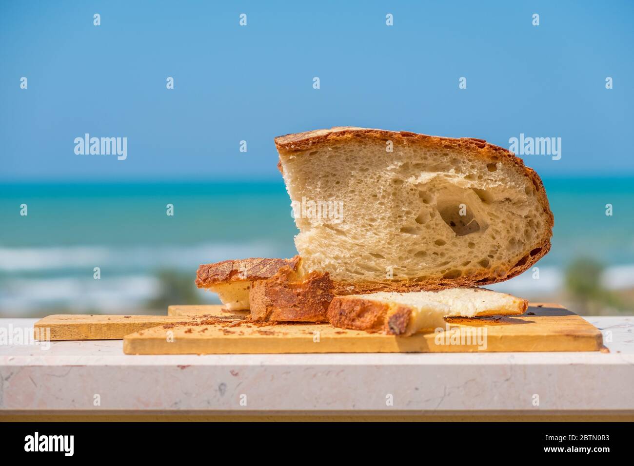 bakery shop background with Pane Pugliese, a traditional bread of South Italy food tradition Stock Photo
