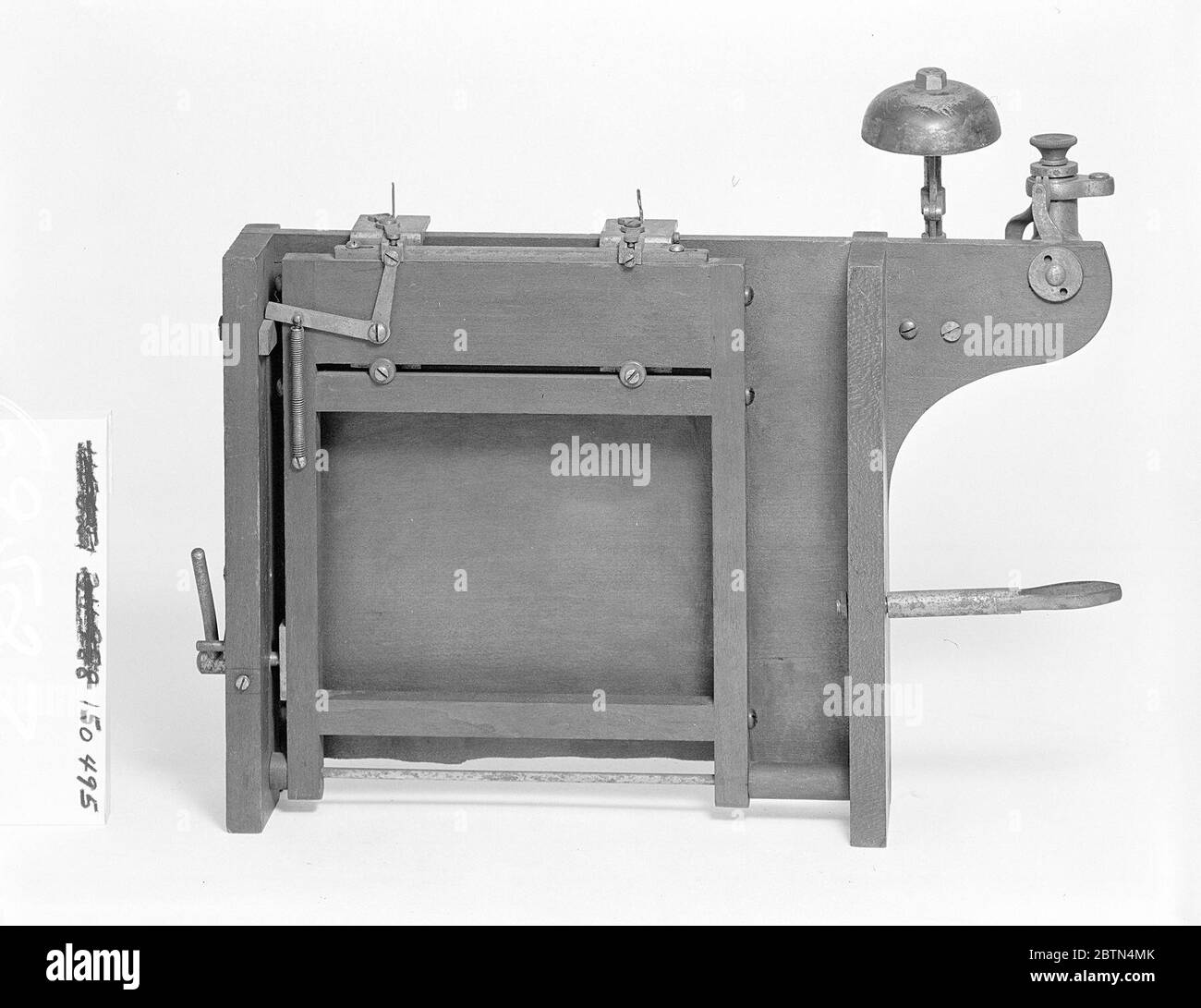 Patent Model of a Bookstitching Machine. This patent model demonstrates an invention for a book-stitching machine which was granted patent number 150495. Stock Photo