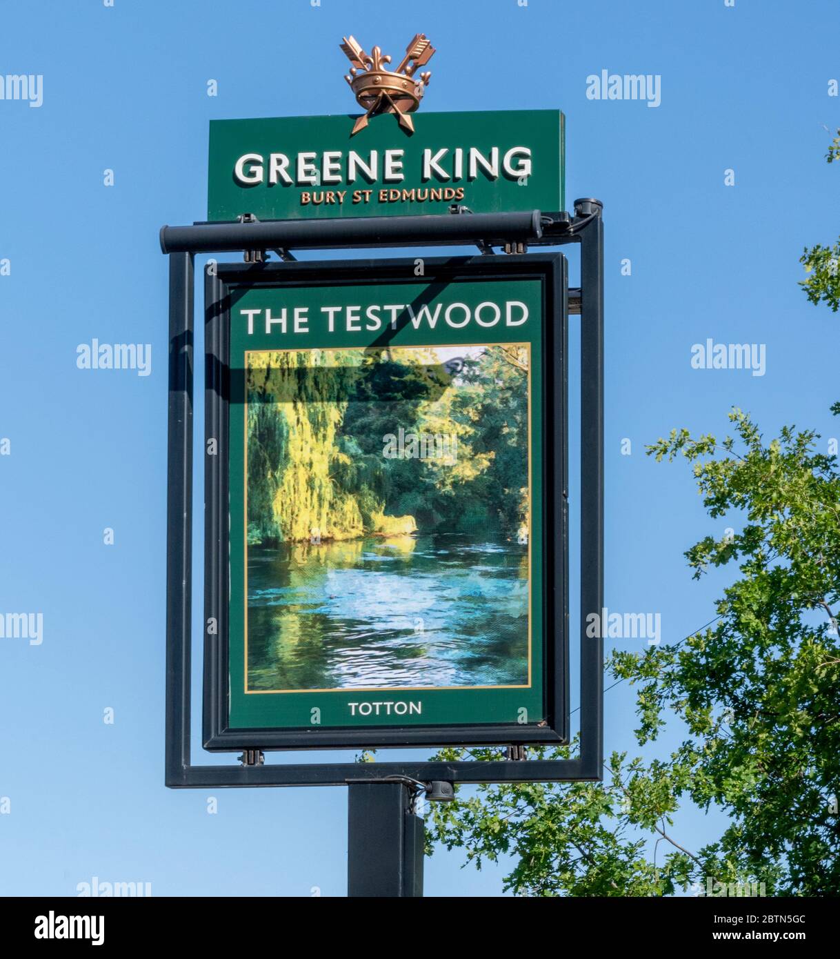 Traditional hanging pub sign at The Testwood public house, a Greene King pub, Salisbury Road, Totton, Hampshire, England, UK Stock Photo