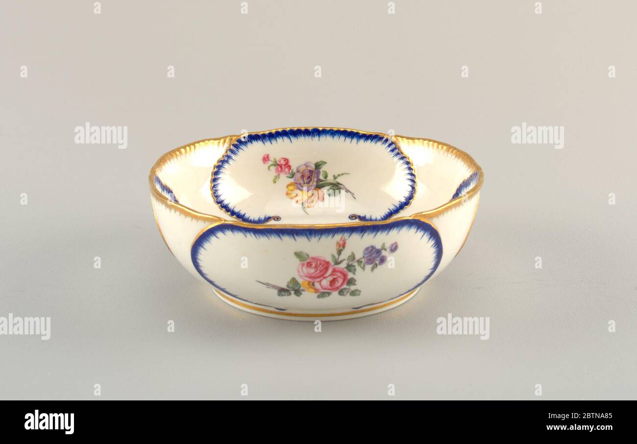 Salad Bowl with Painted Cabbage Leaves Saladier Feuilles de Chou. Research  in ProgressOval bowl on low foot. Floral bouquets within oval cartouches  outlined in gilding and cobalt. Gilding at rim and foot