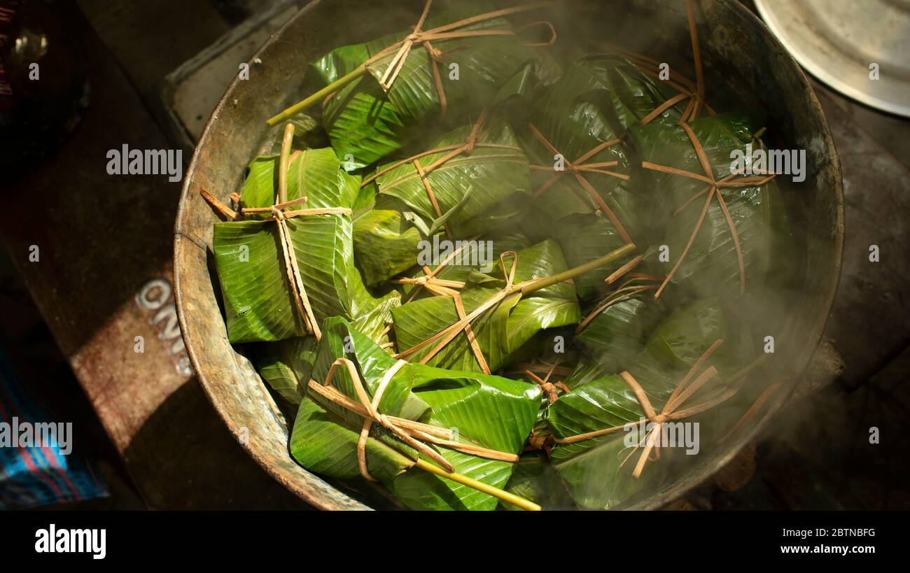 Guatemalan Tamales (corn husk cooked with meat, wrapped in banana