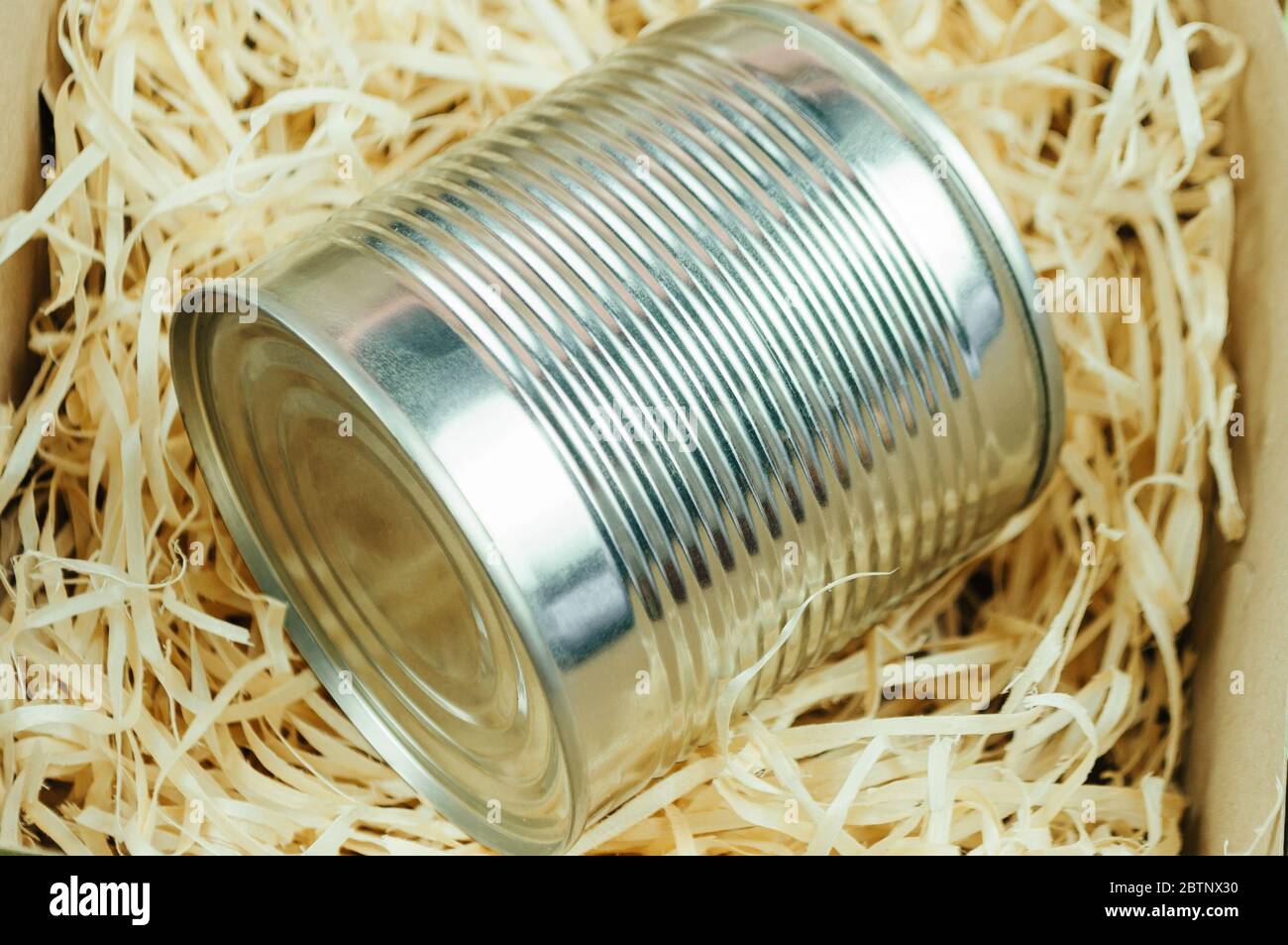 Food donation canned food in a corton box, top view with copy space