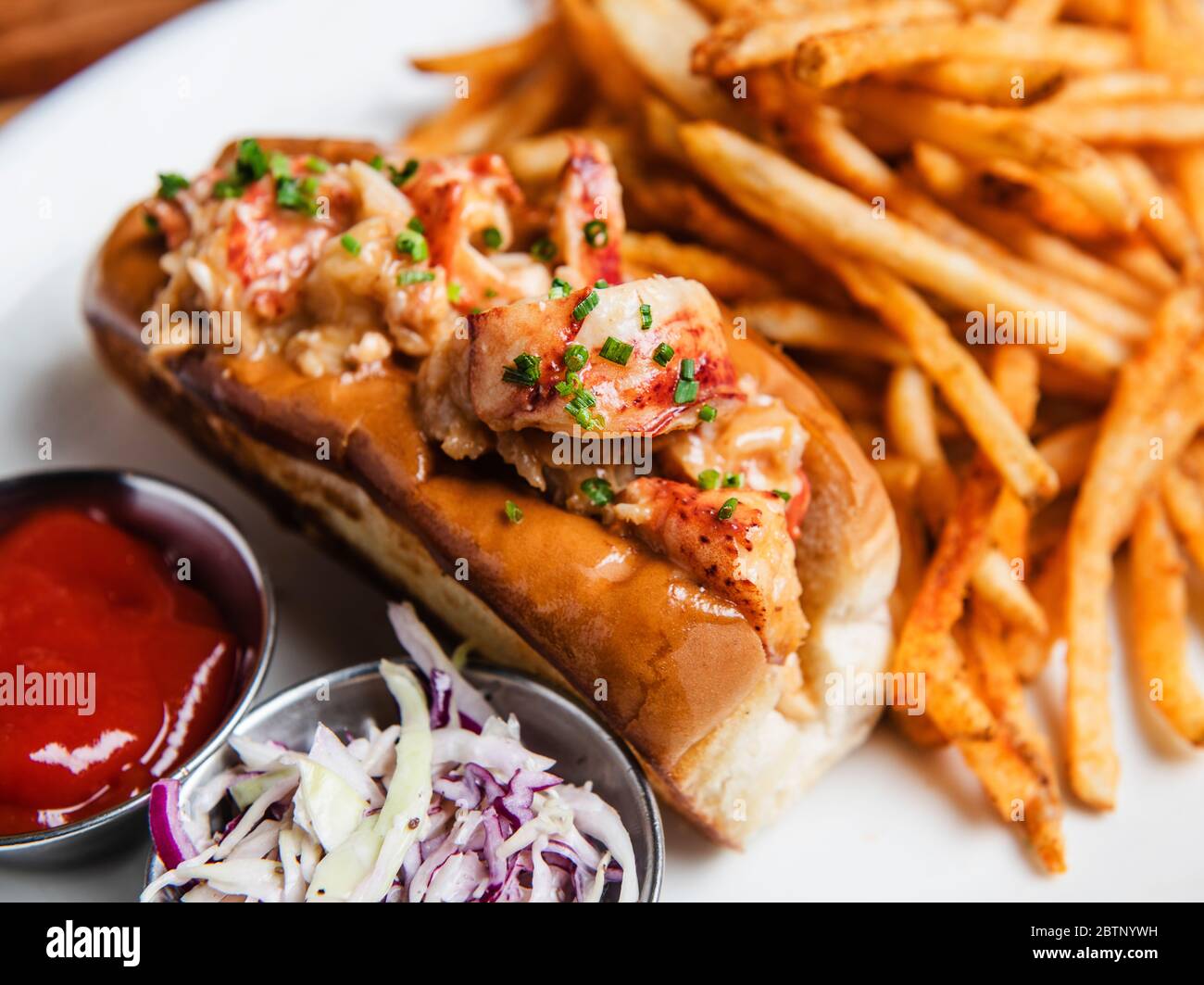 Lobster roll sandwhich with French Fries Stock Photo