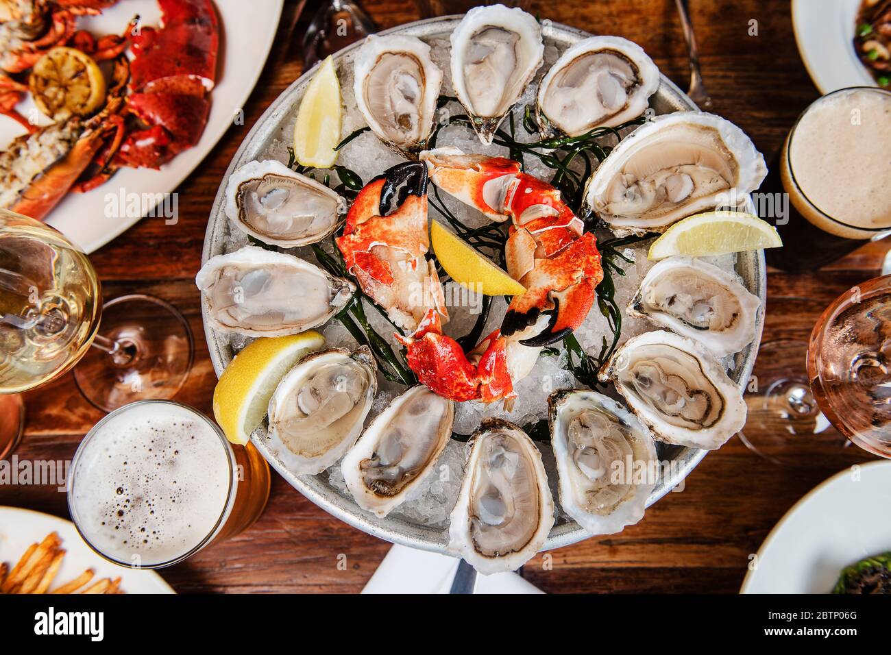 Seafood platter with oysters and crab claws Stock Photo Alamy