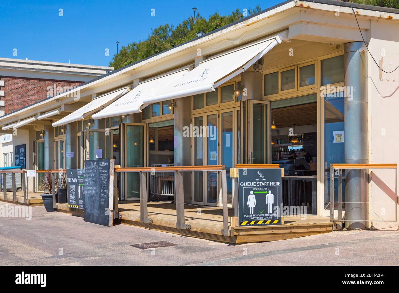 Westbeach restaurant opens with social distancing measures in place after easing of Coronavirus COVID 19 restrictions, Bournemouth, Dorset UK in May Stock Photo