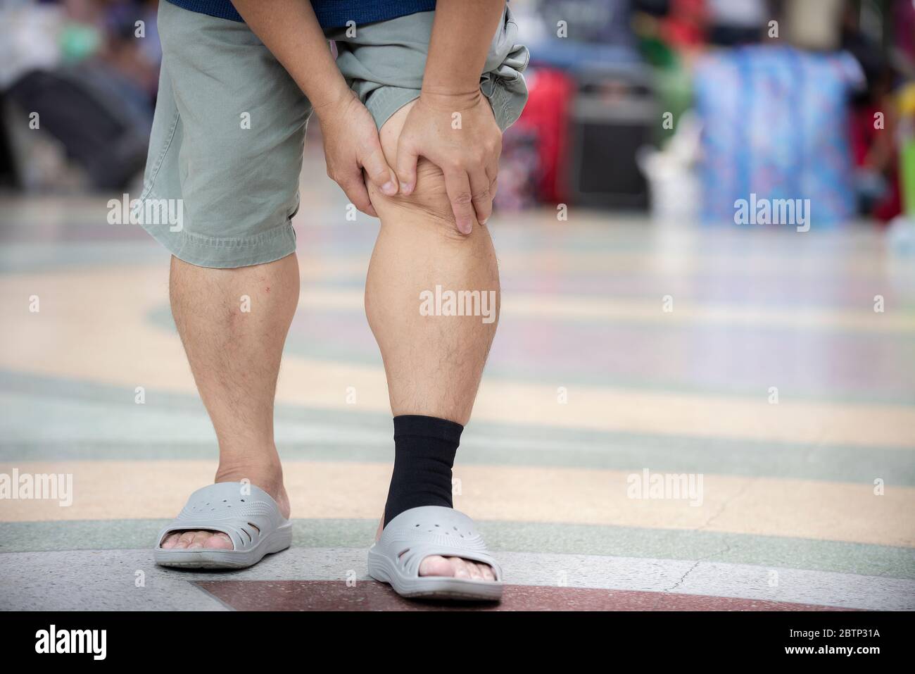 Senior man having knee problems Stock Photo