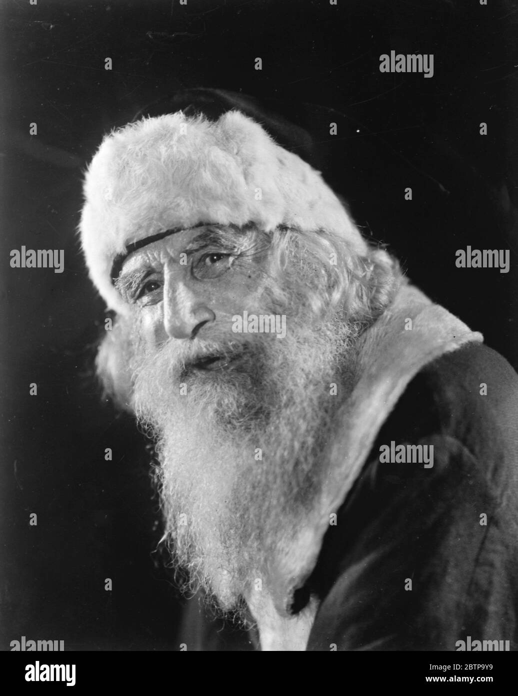 A smile for millions . A happy study of Father Christmas , whose smile , as usual , will be welcomed by millions this festive season . 20 December 1926 Stock Photo