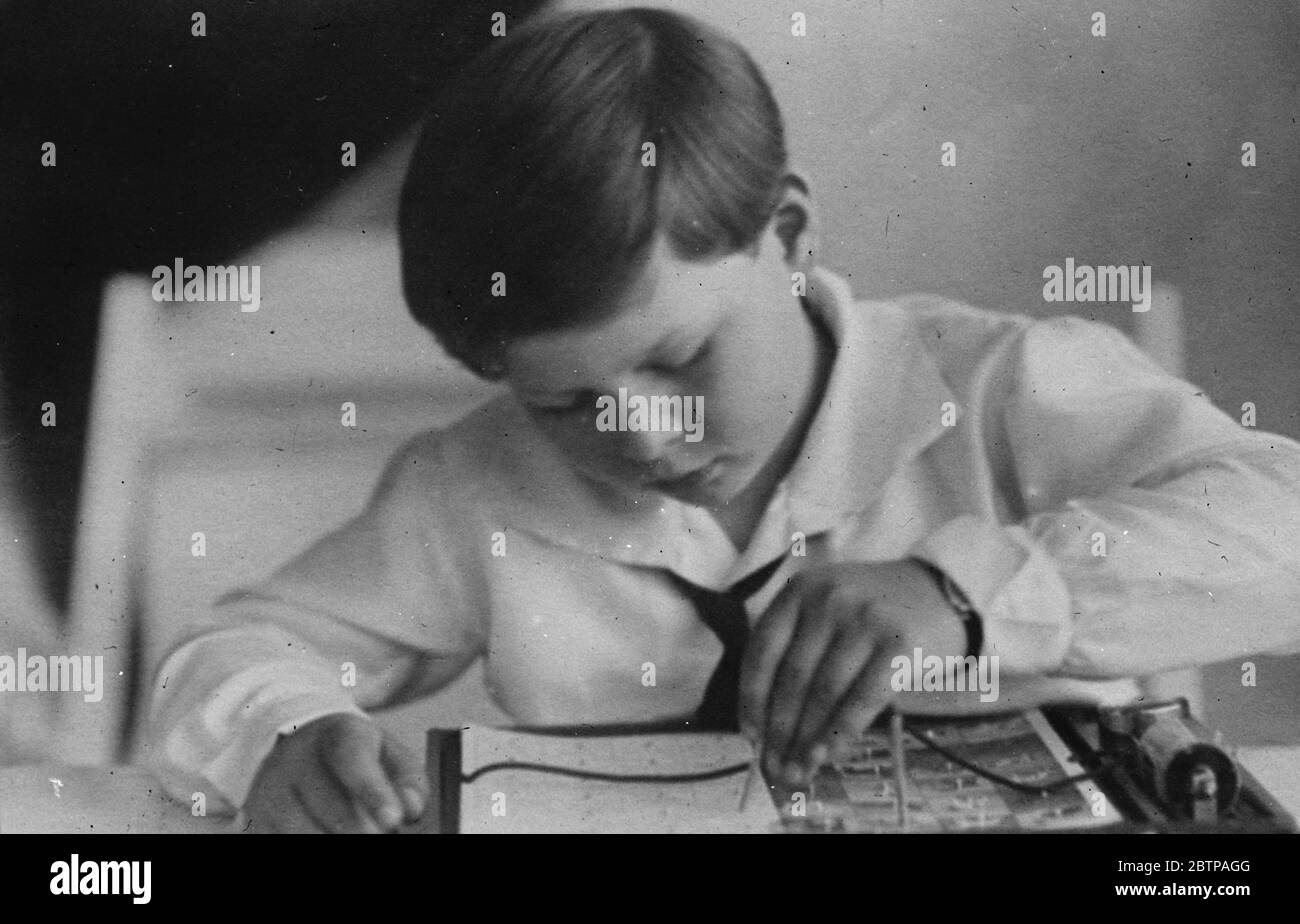 A King at play . King Michael of Rumania with one of his Christmas toys . 5 January 1929 Stock Photo