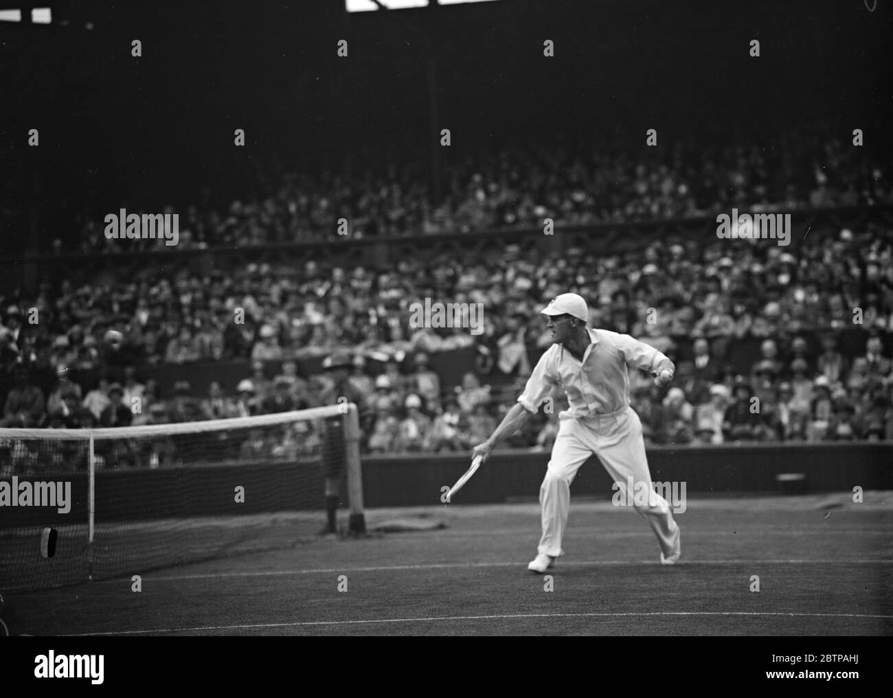 Wimbledon lawn tennis championships . P D Spence ( South Africa ) defeated by J Bortra ( France ) . 28 June 1928 Stock Photo
