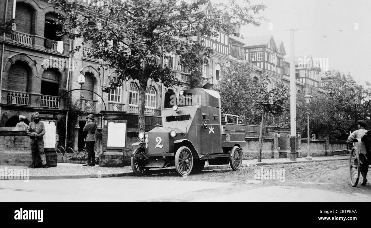 The situation in China . A British armoured car on duty in a street at Shanghai . 2 February 1927 Stock Photo